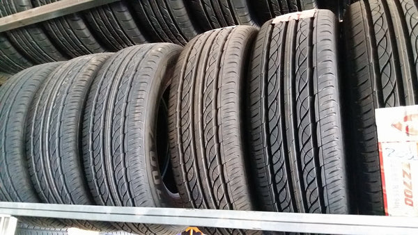 20565R15 94H Firestone TZ700